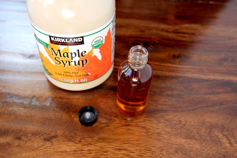 filling maple syrup bottles