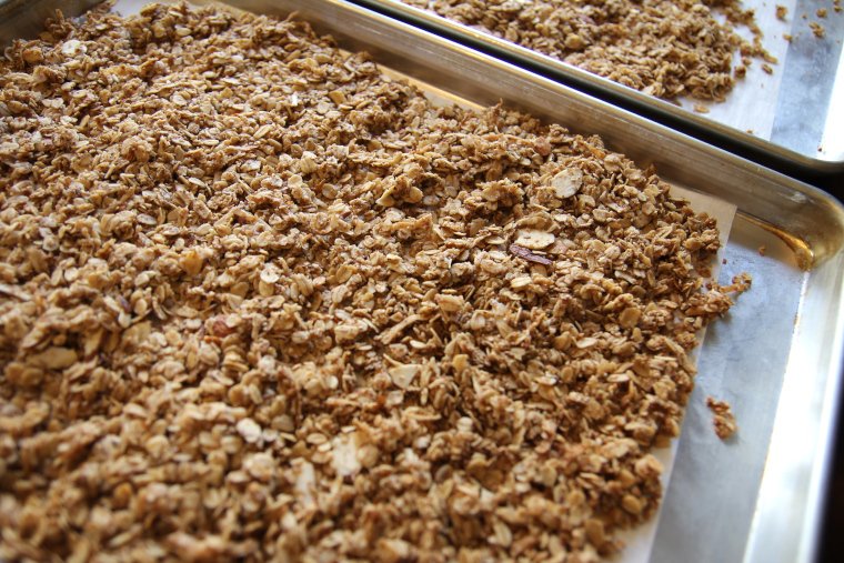 granola cooling on pans