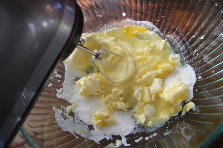 mixing butter, sugar, and eggs