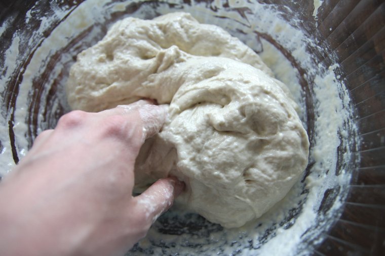 squeeze with fingers until dough comes back together