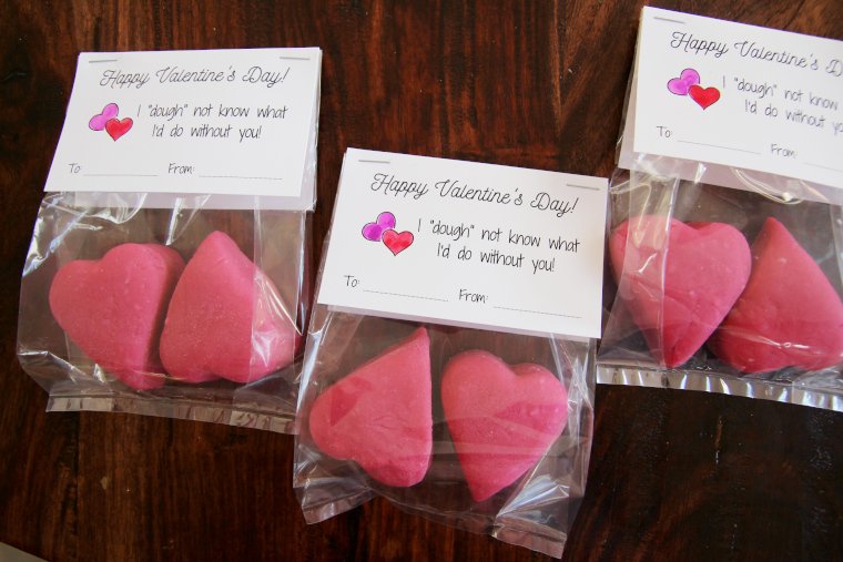 punny playdough valentines sitting on a table