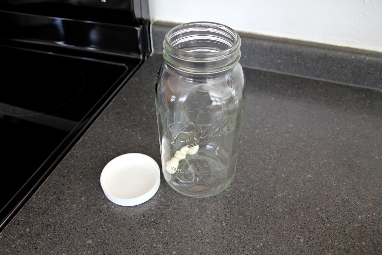 kefir grains in a half-gallon jar