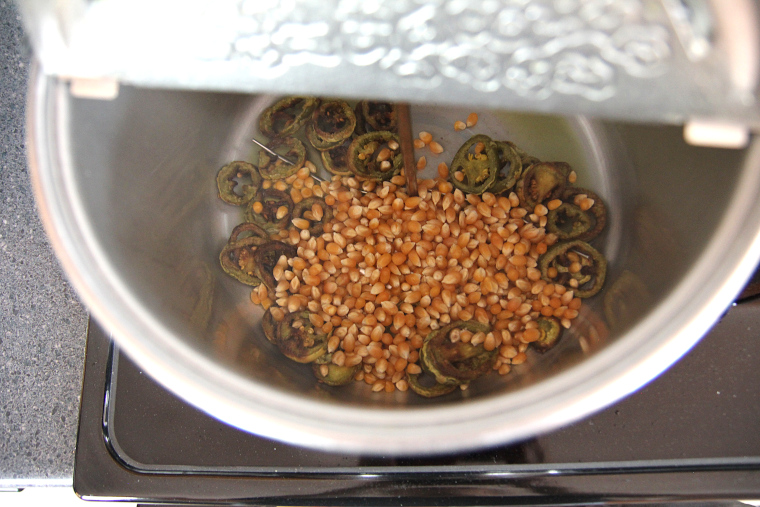 adding popcorn kernels