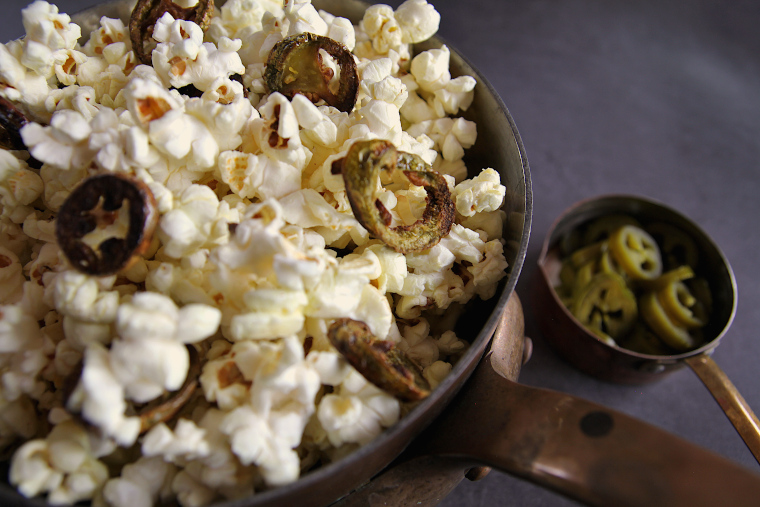 jalapeno popcorn in copper sauce pan close up