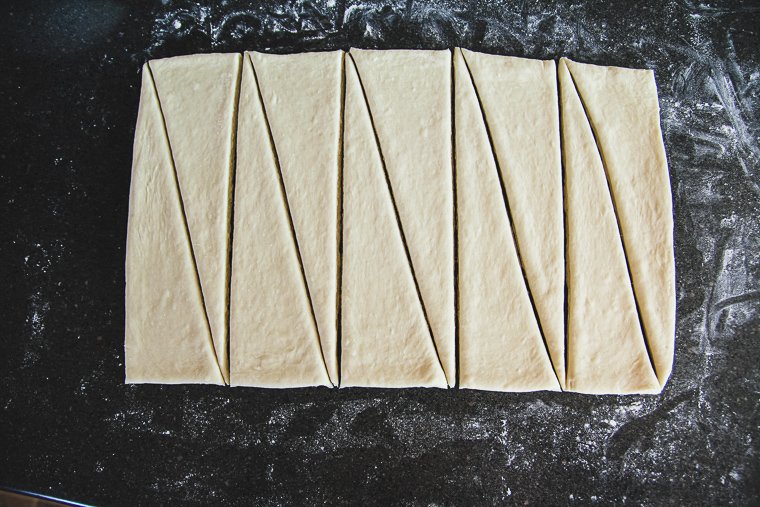 dough cut into 10 triangles