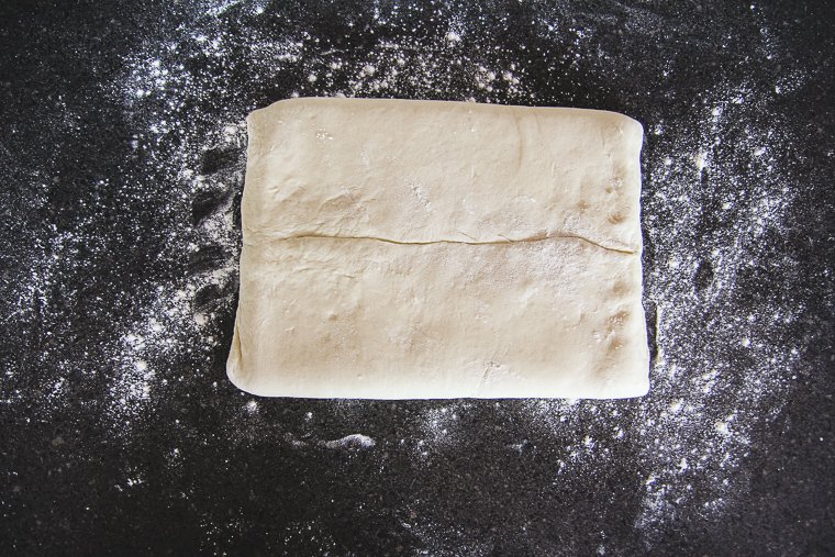 Turning the dough so the seam is facing me