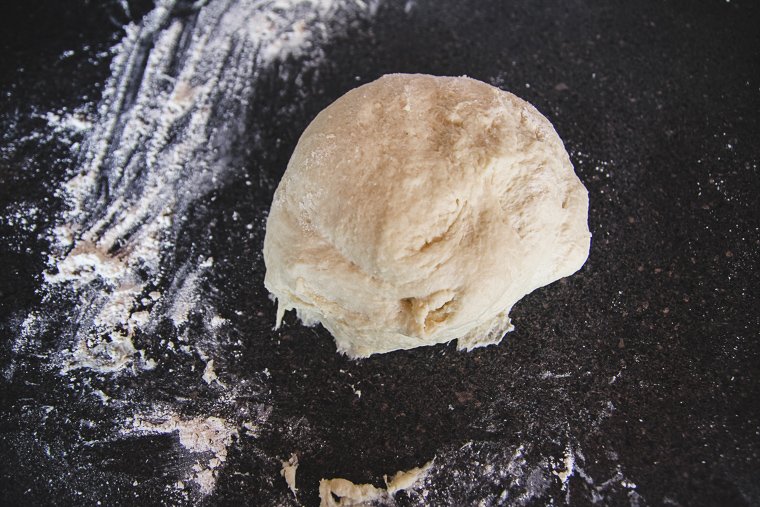 smooth dough in a ball after kneading