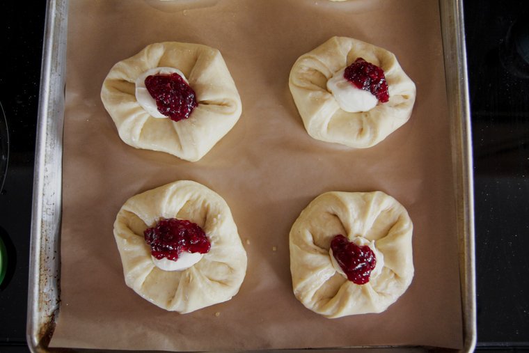 pastries with cheese and fruit filling, ready to bake