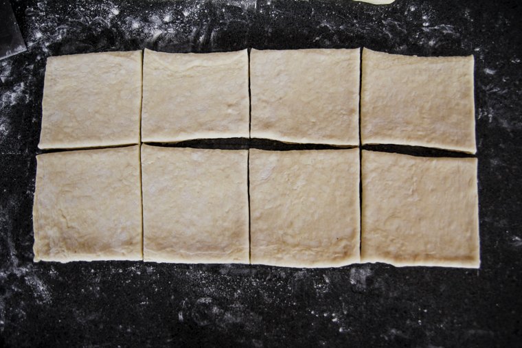 dough with edges trimmed cut into 8 squares