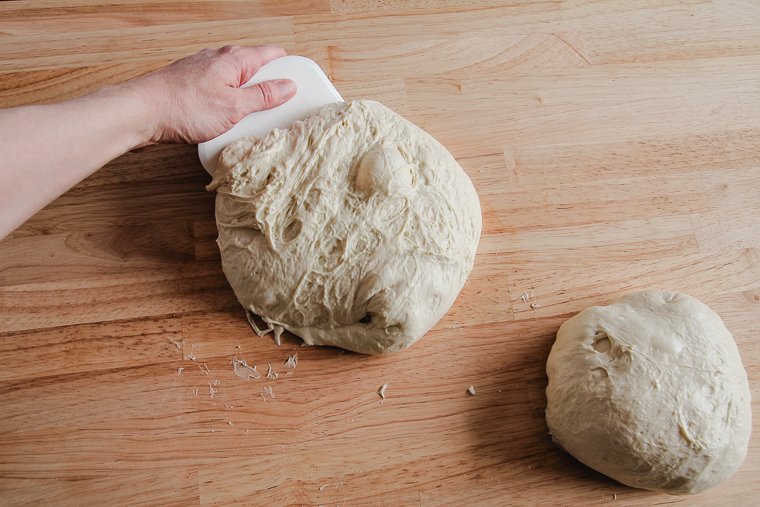 preshaping dough with a bench scraper