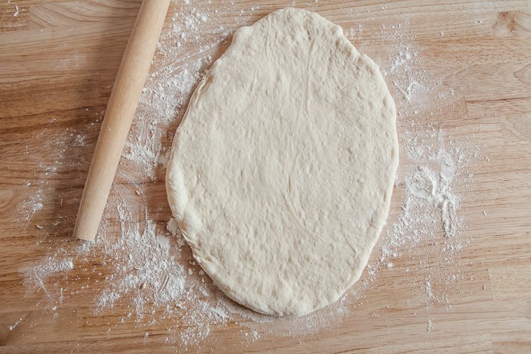 rolling out the dough to 1/2-inch thickness