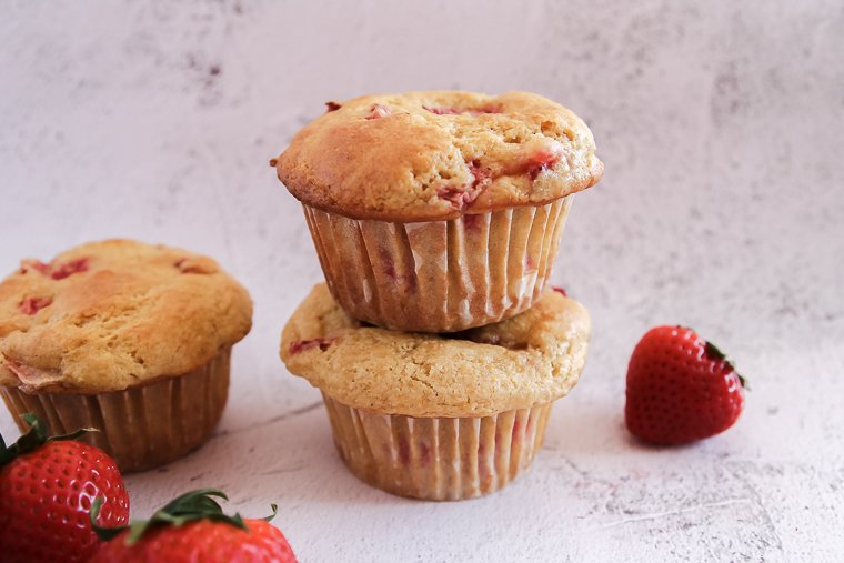 two millet muffins stacked 