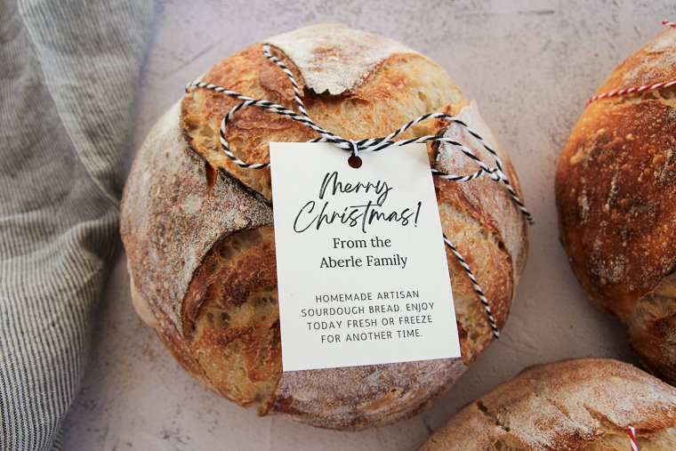 a sourdough loaf wrapped as a gift