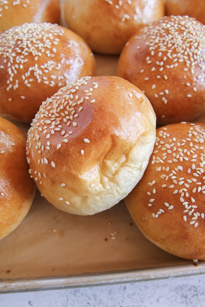 a side view showing how soft and light the sourdough bread buns are when baked