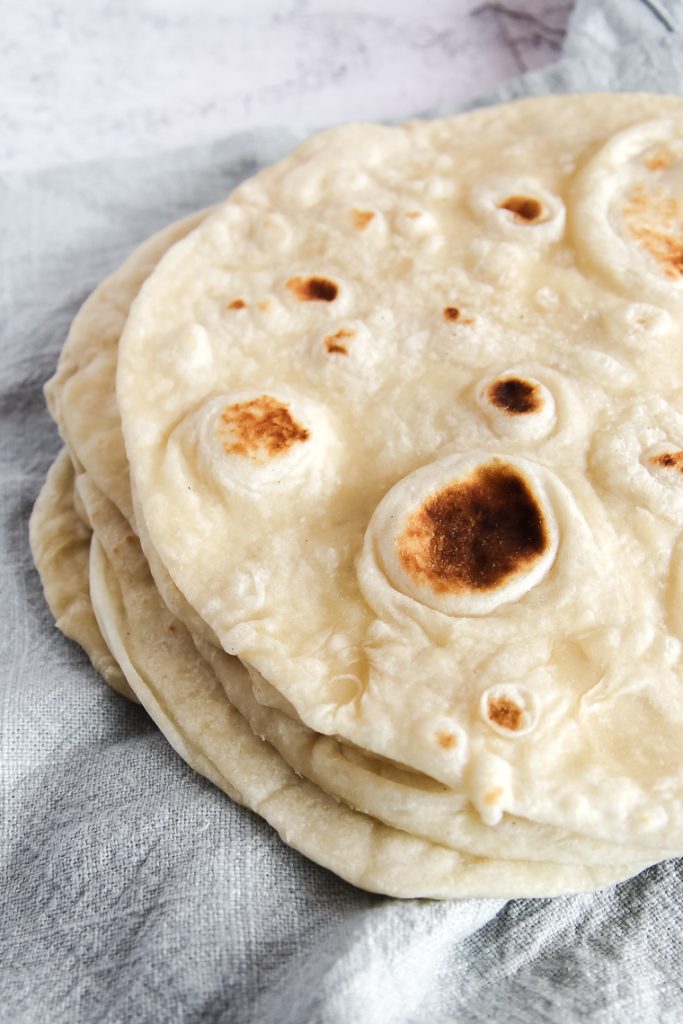 close up of a white flour tortilla