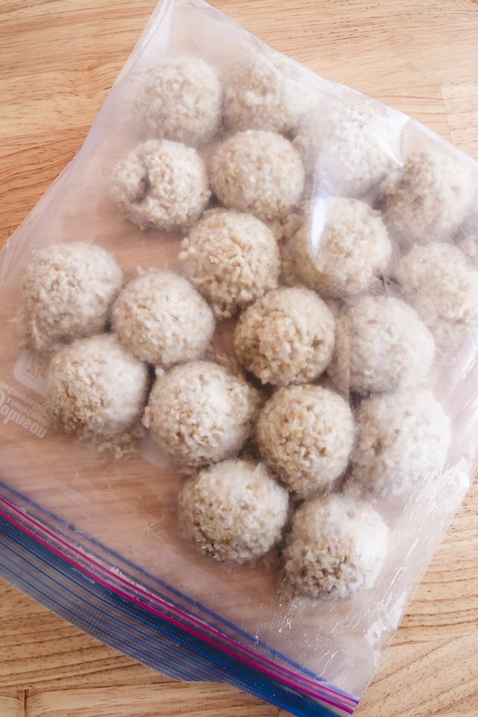 a freezer bag full of oatmeal balls to freeze for meal prep