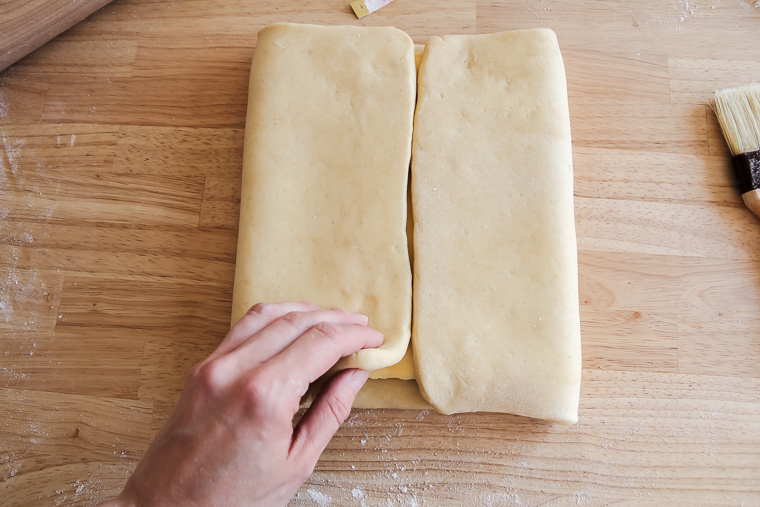 folding the second side of the dough over the butter block