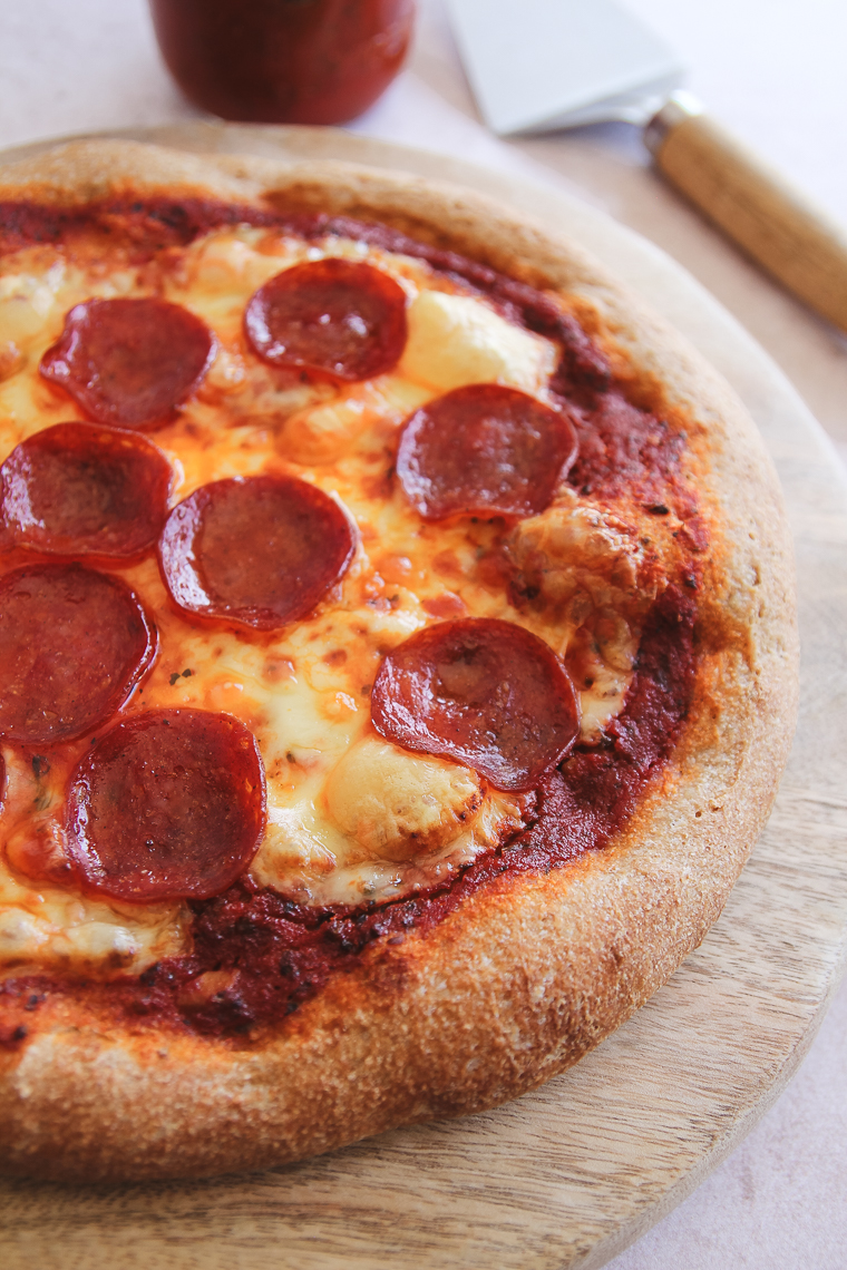 whole wheat sourdough pizza with pepperoni, close up