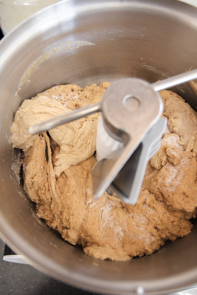 adding whole wheat sourdough starter and salt